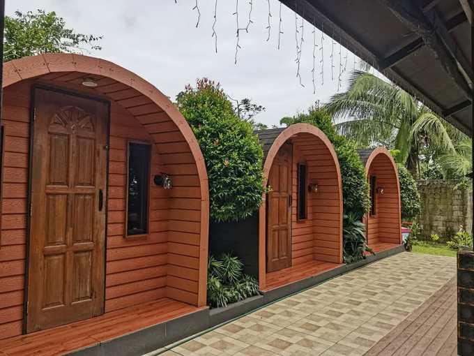Arched wooden guest rooms